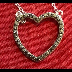 Posh Sterling Silver 18” necklace with natural black Diamond heart pendant.